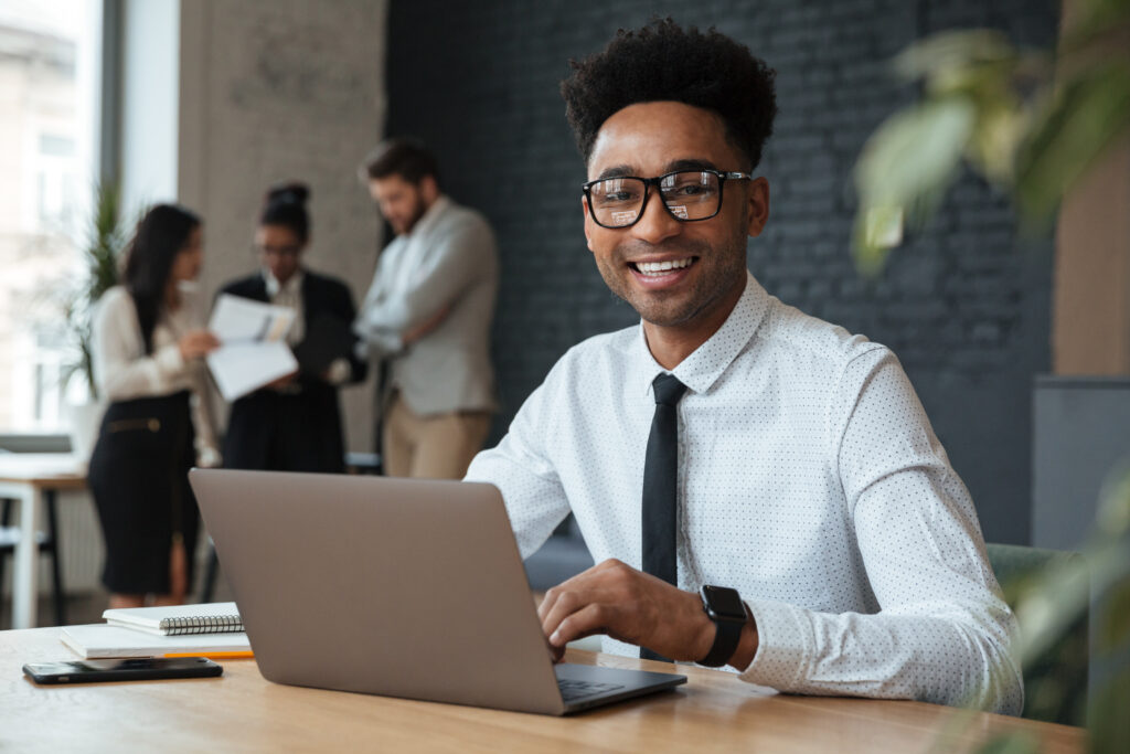 happy young african businessman